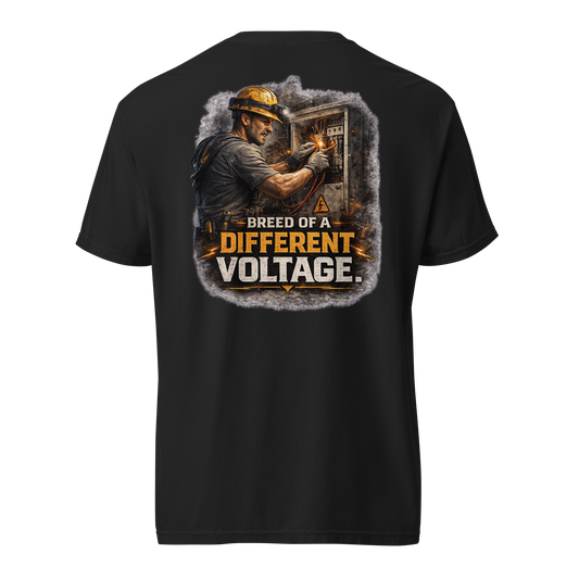 Professional electrician shirt featuring a skilled electrician working on electrical equipment with the phrase Breed of a Different Voltage.